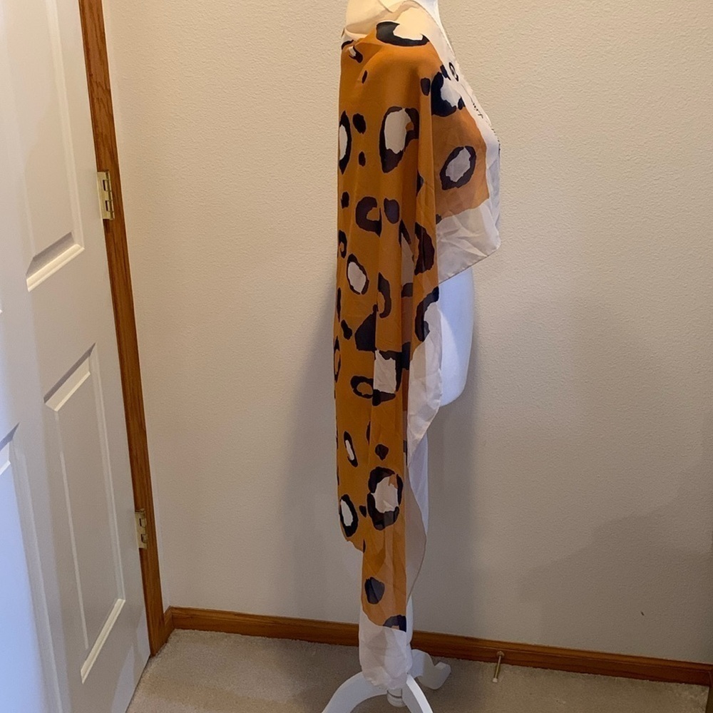 3.1 Phillip Lim Womens Silk multi use scarf. Kind of a burnt orange animal print